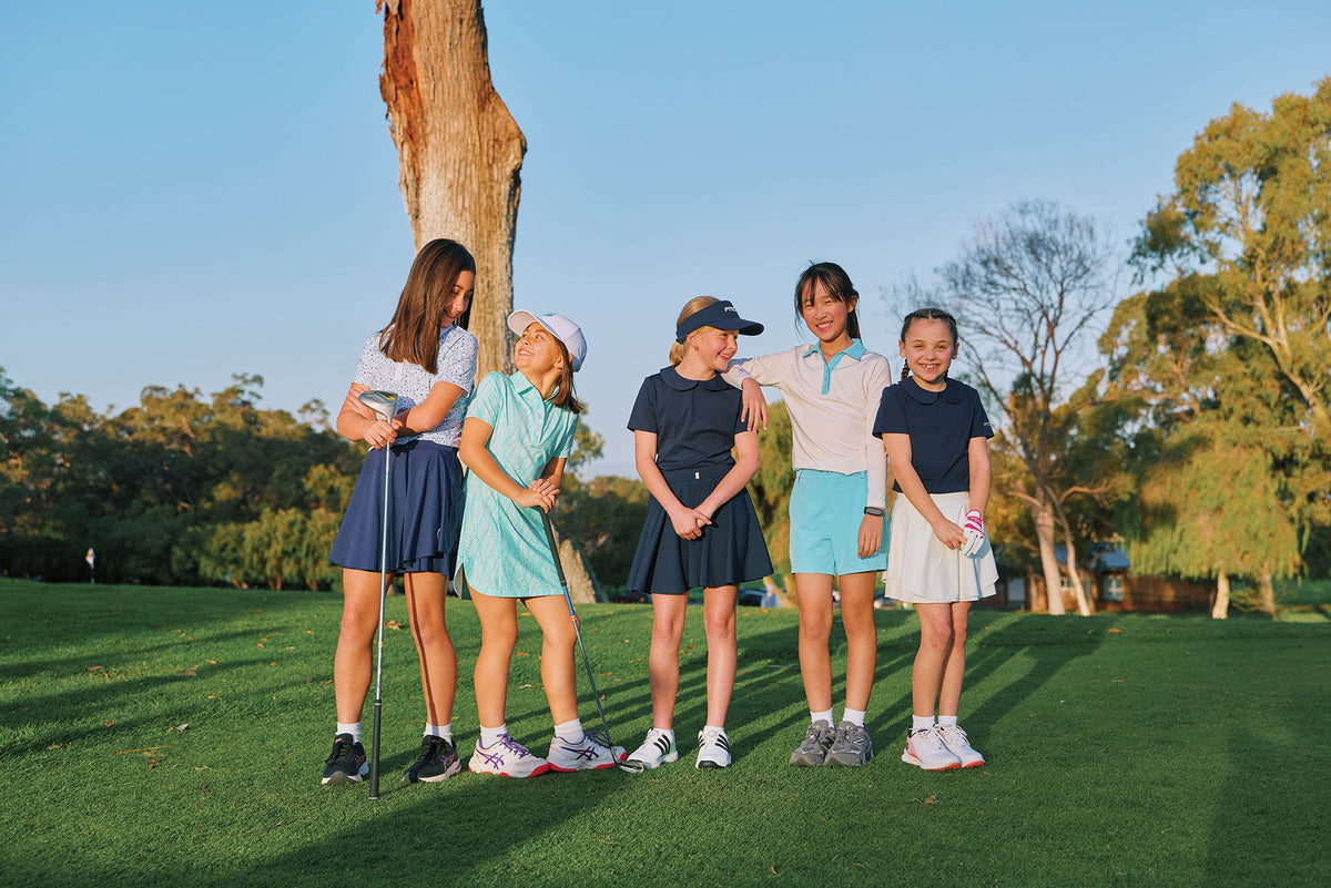Girls playing golf in style girls golf clothes