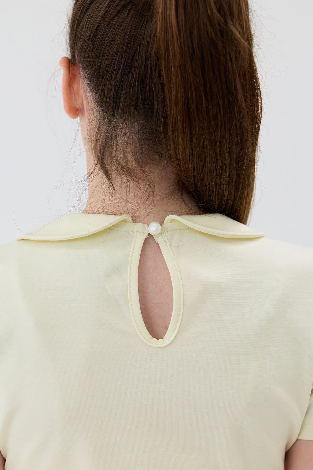 Sunshine Yellow Golf top Reverse Detail
